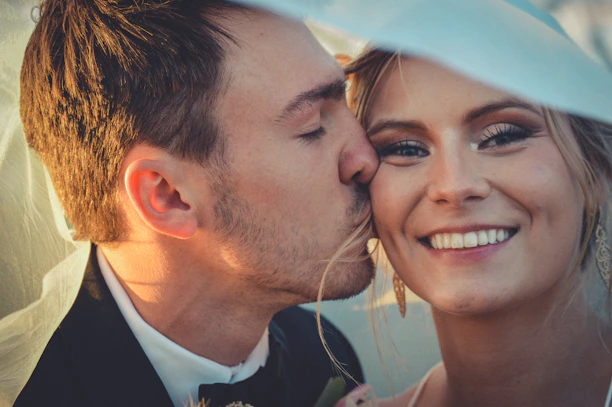 Close-up of a vibrant wedding art piece featuring the couple’s joyful expressions.