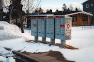Close shot of a snowplow-safe breakaway mailbox post following Ohio Department of Transportation standards.
