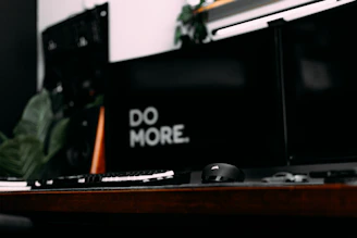 Blue and black themed workspace with white lettering on screens