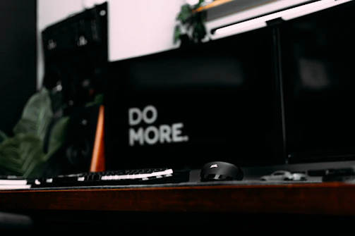 Blue and black themed workspace with white lettering on screens