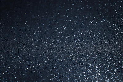 A stylish basement floor featuring metallic epoxy with shimmering effects.
