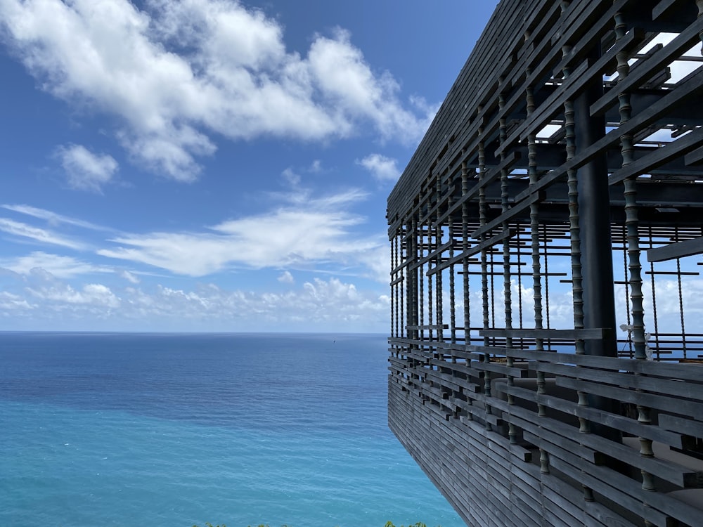 a view of the ocean from the top of a building