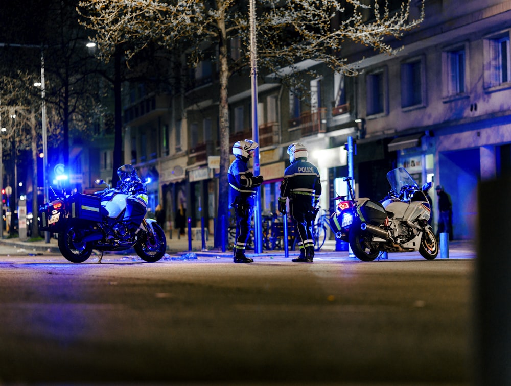 a group of motorcycles parked on the side of a road