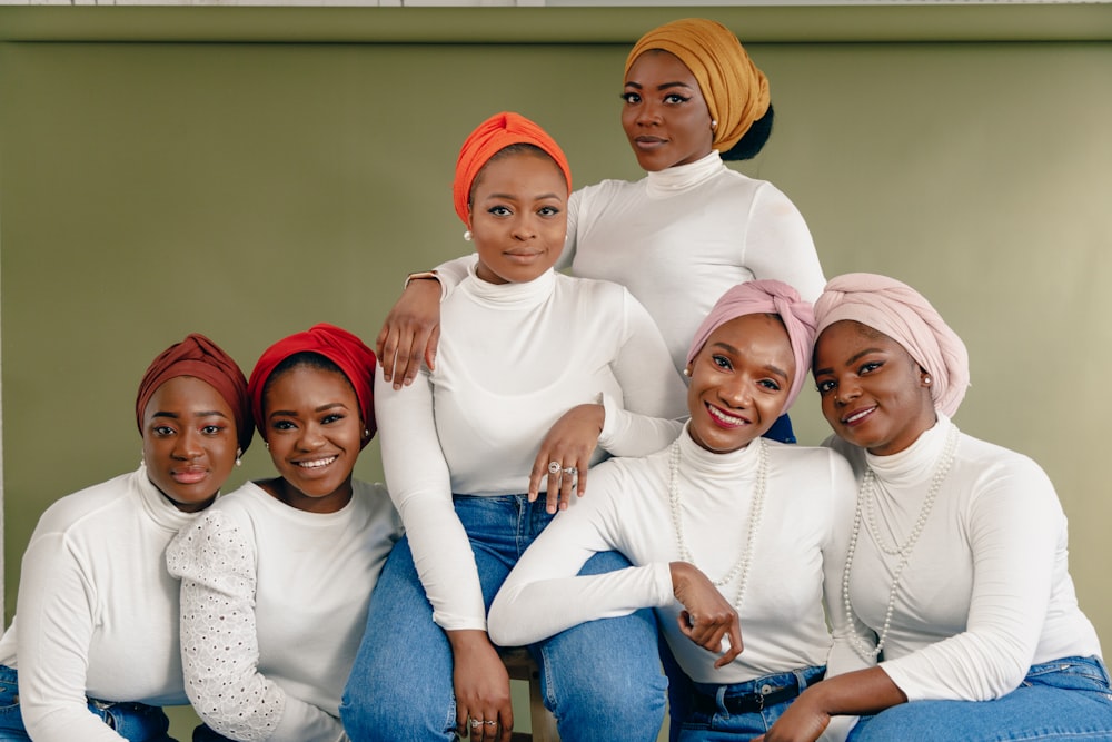 a group of women sitting next to each other