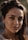 a close up of a person wearing earrings