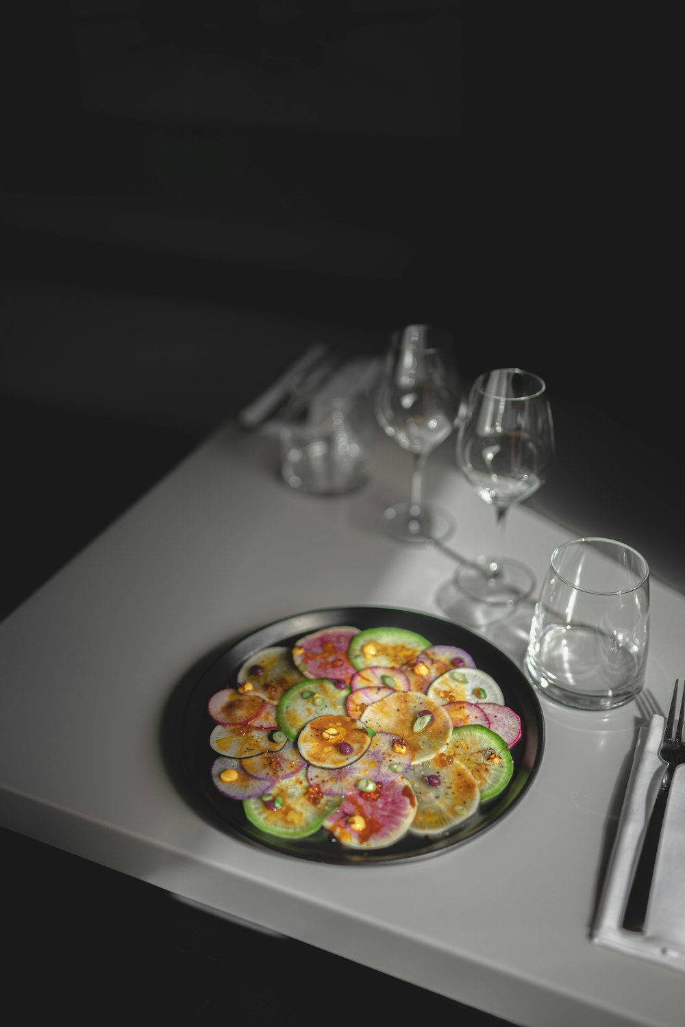 a plate of food sitting on top of a table