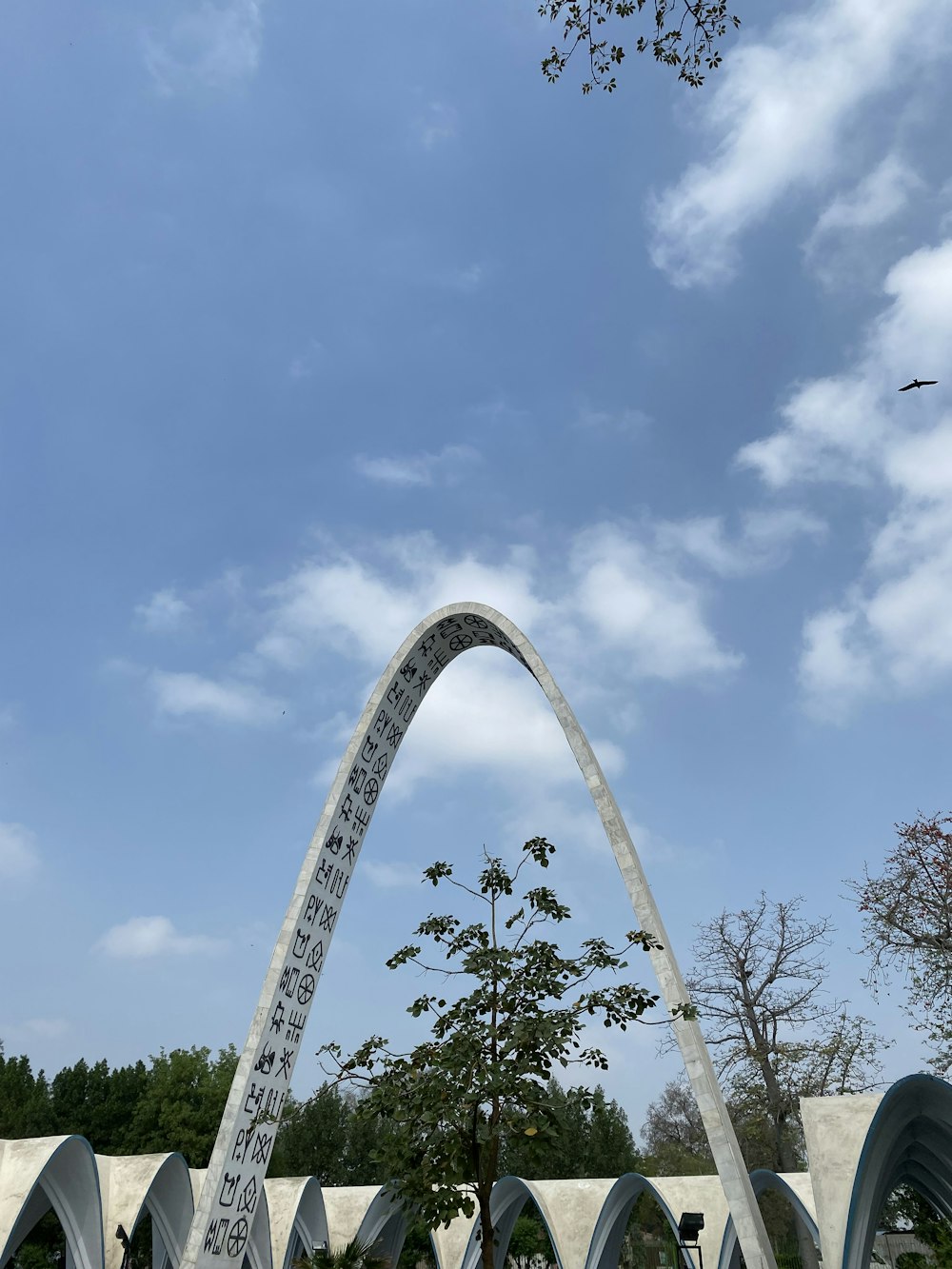 a large monument with a very tall arch in the middle of it