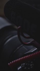 Close-up of a microphone and camera setup for a live interview.