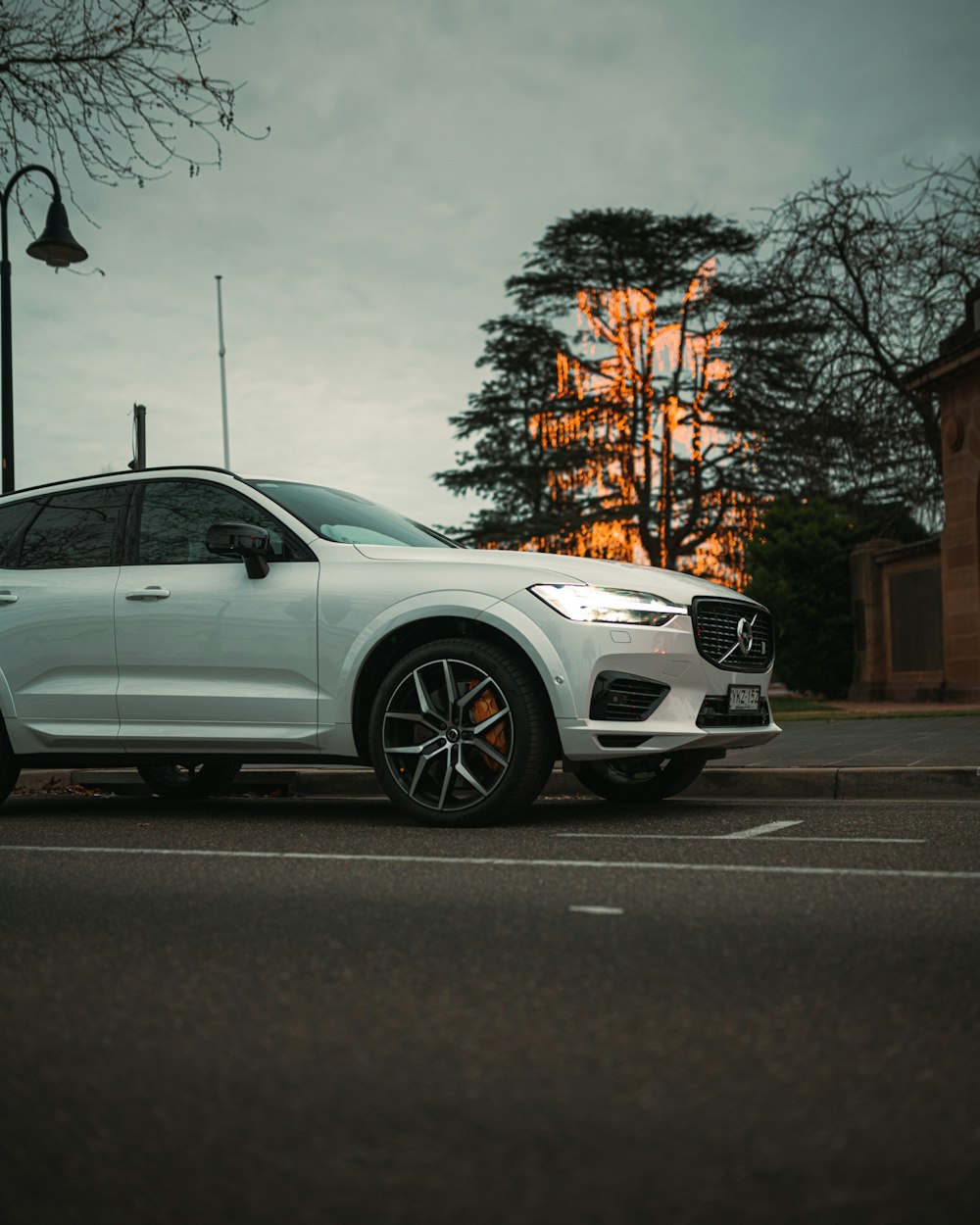 a white car parked in a parking lot