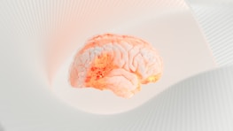 Close-up of a neural brain design glowing with smooth lighting and depth effects.