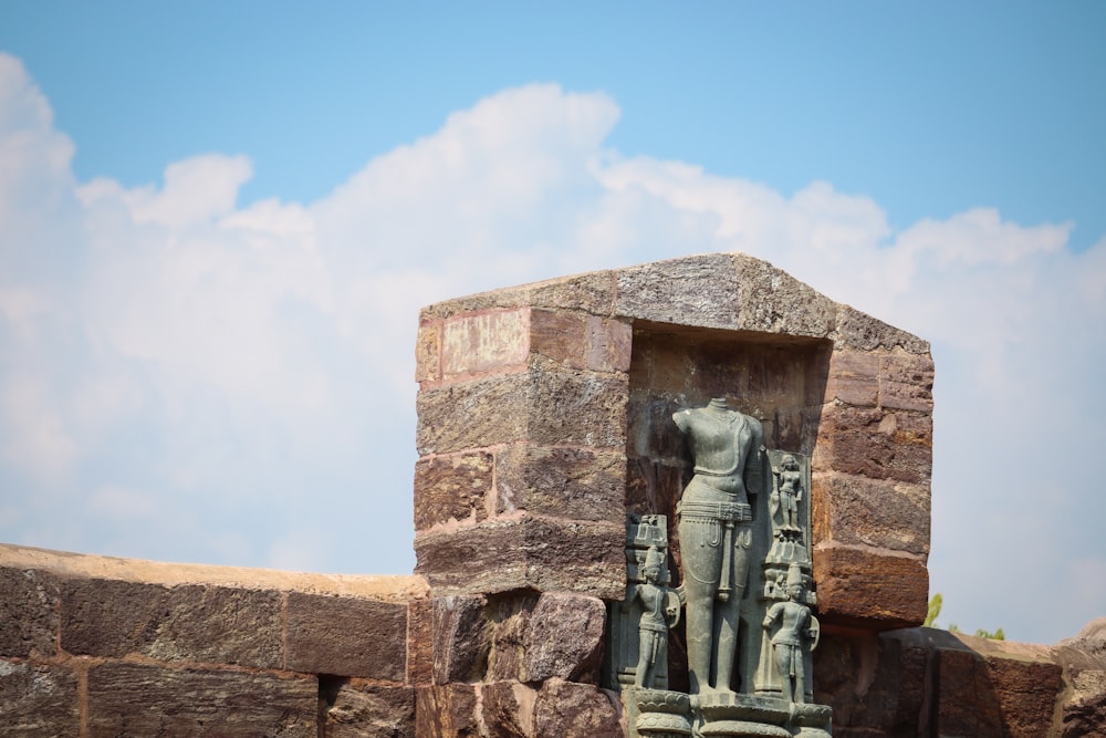 a statue of a man holding a woman's hand