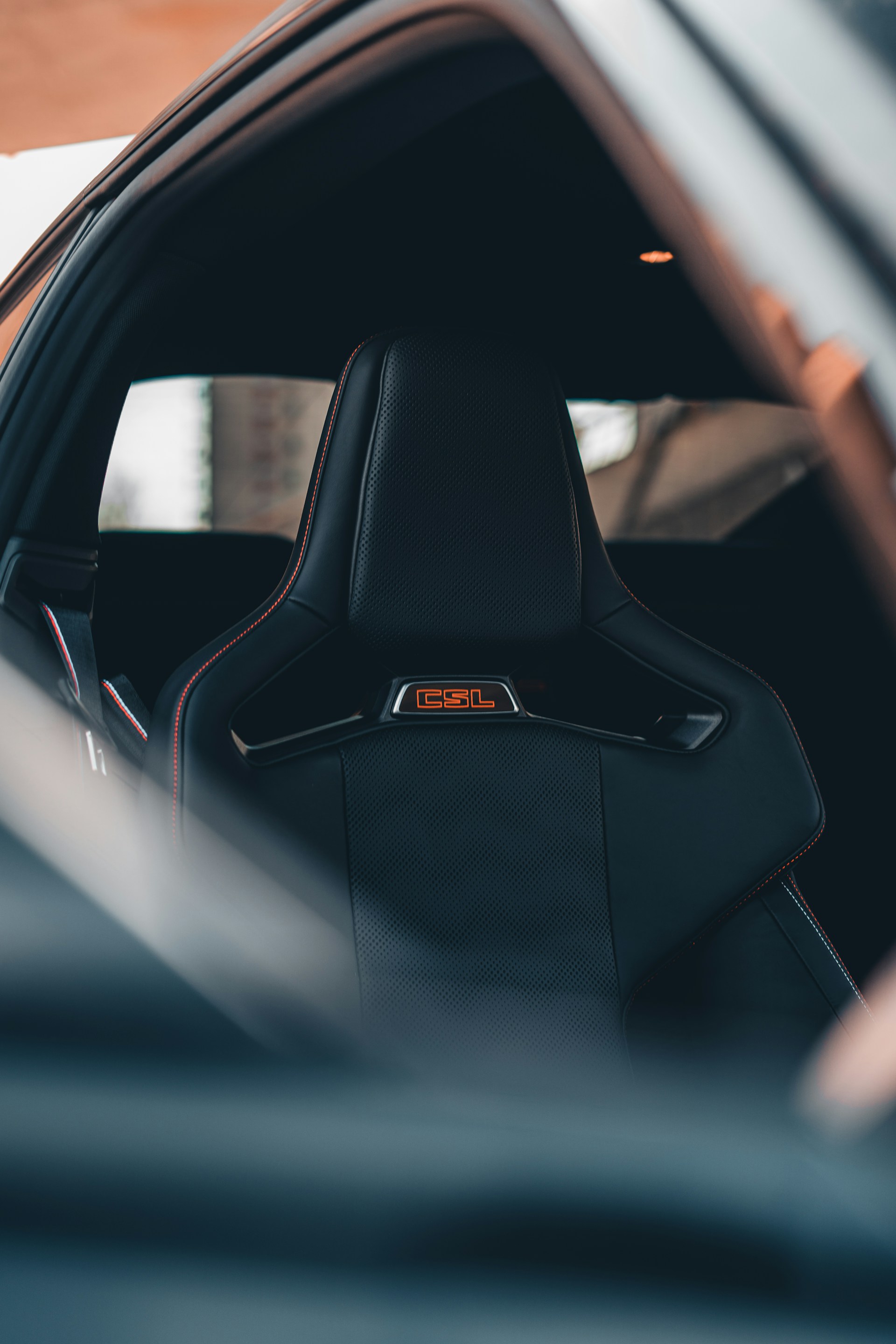 a close up of a car's interior with the door open