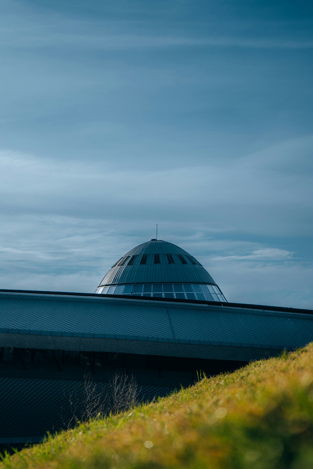 a dome on top of a building on a hill