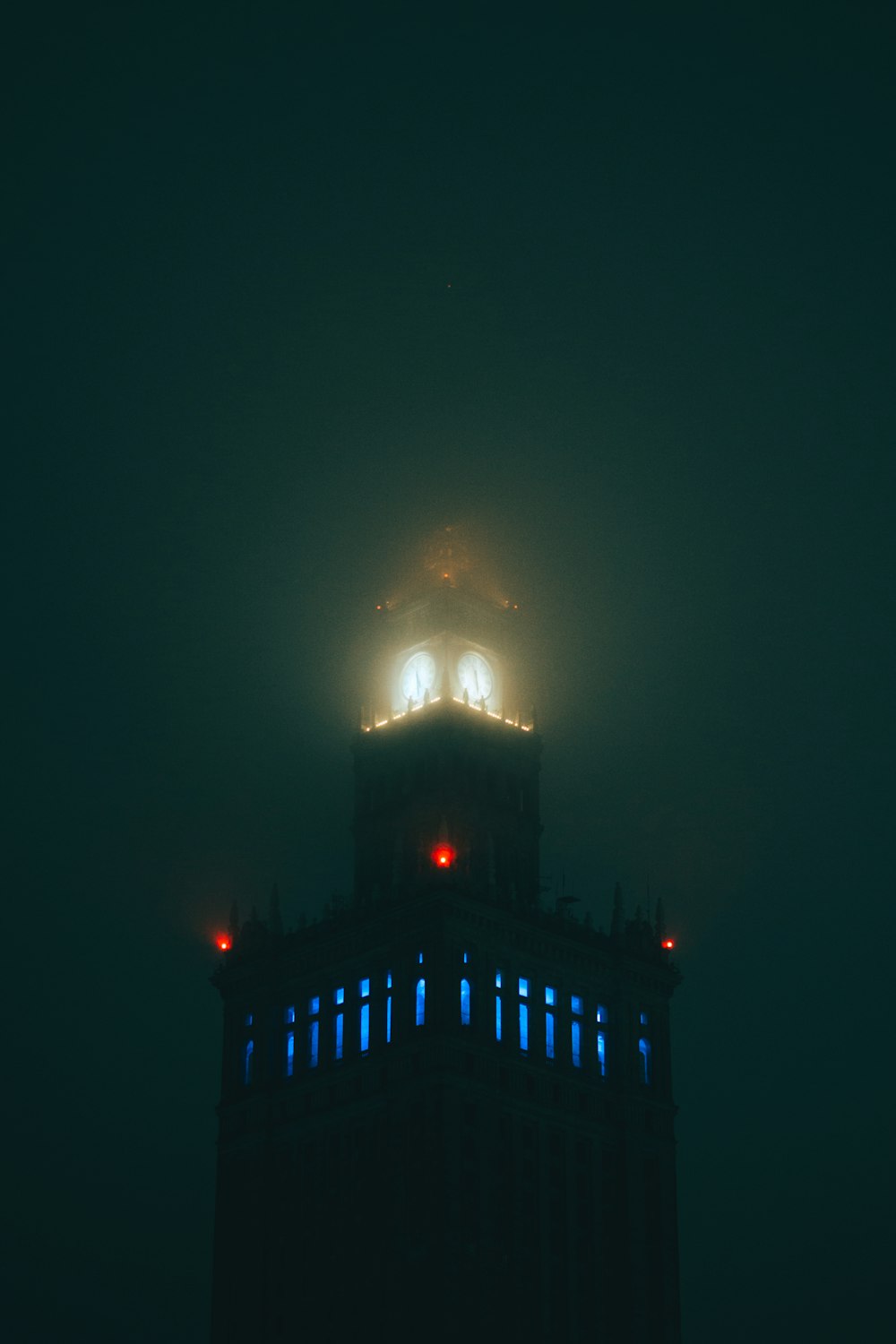a tall building with a light on top of it