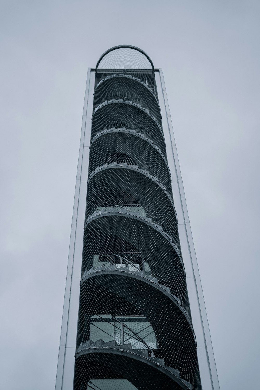 a very tall tower with a bunch of balconies on it