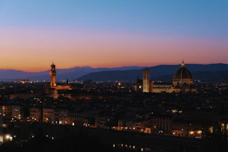 Elegant cityscape of Graz at dusk with soft lighting reflecting a sophisticated atmosphere.