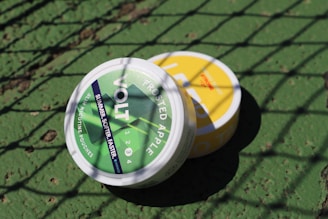 Industrial-grade fungicide containers with emerald green and navy labels.