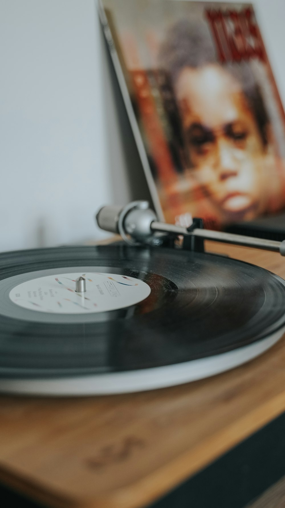 a record player with a record in front of it