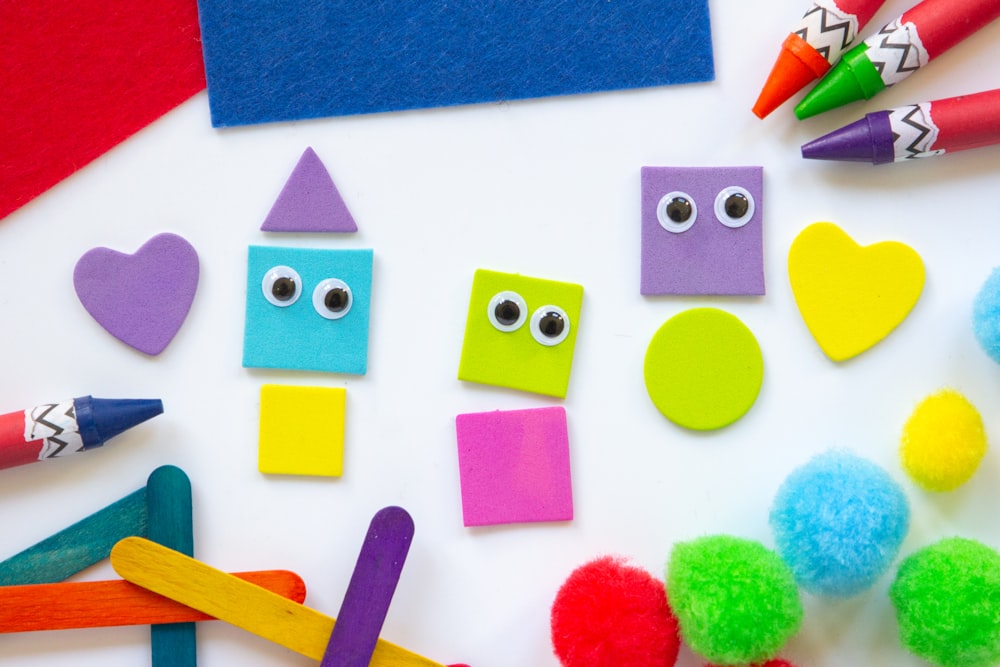 a close up of a bunch of craft items on a table