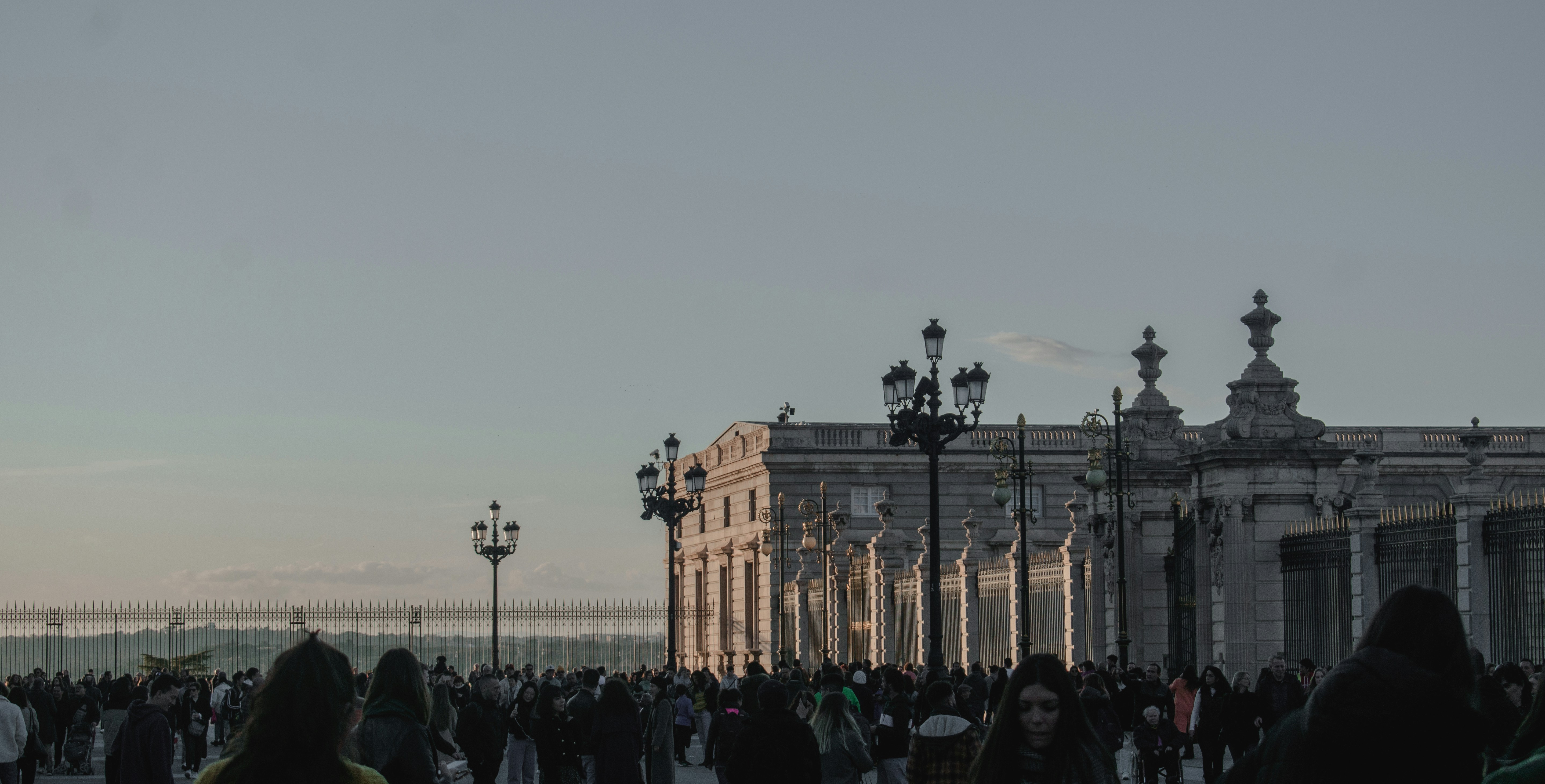 a large group of people standing in front of a building
