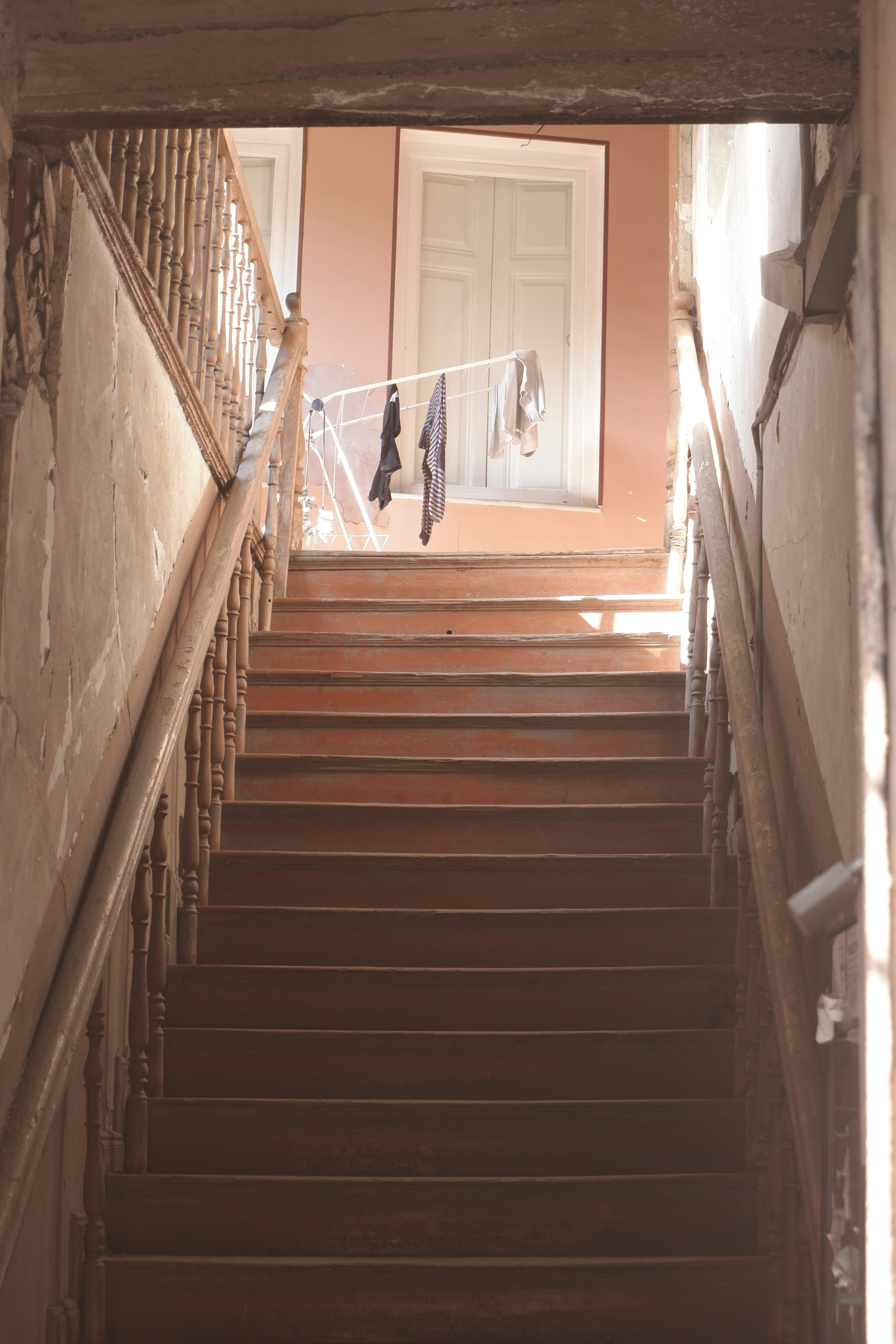 a set of stairs leading up to a door