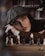 A thoughtful chess arbiter reviewing a tournament match in a quiet setting.