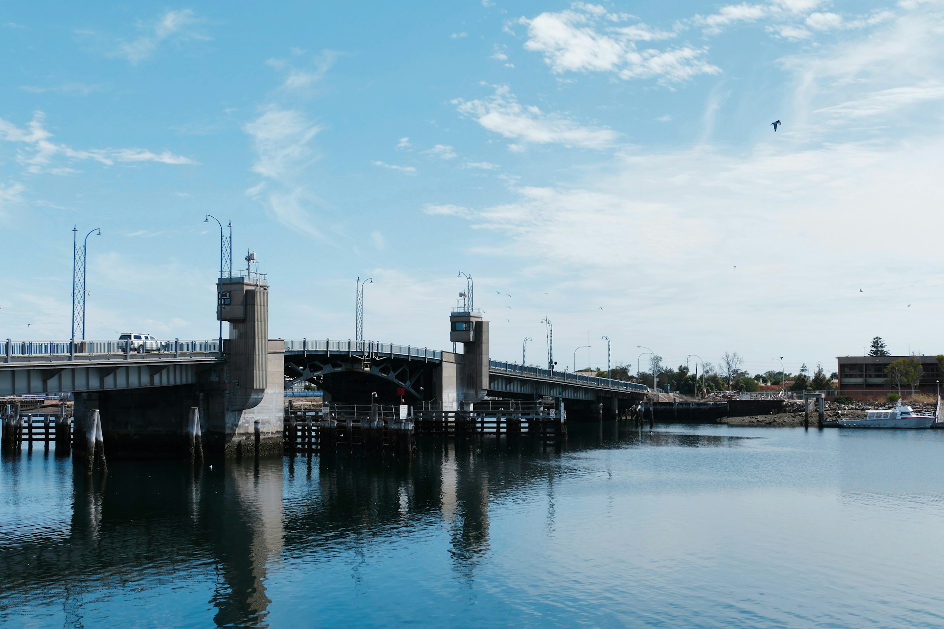 a view of a bridge over a body of water
