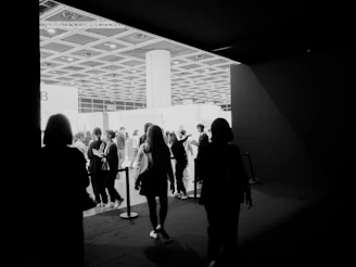 a group of people standing in a room