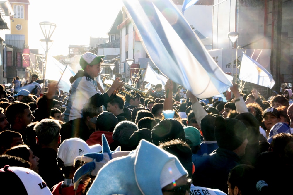 a large crowd of people in a city street