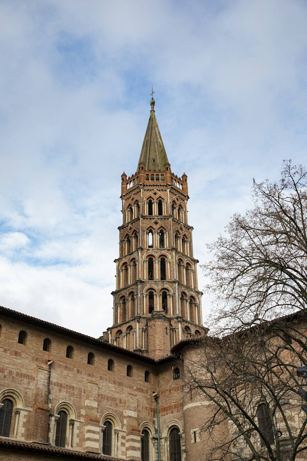 a tall tower with a clock on the top of it