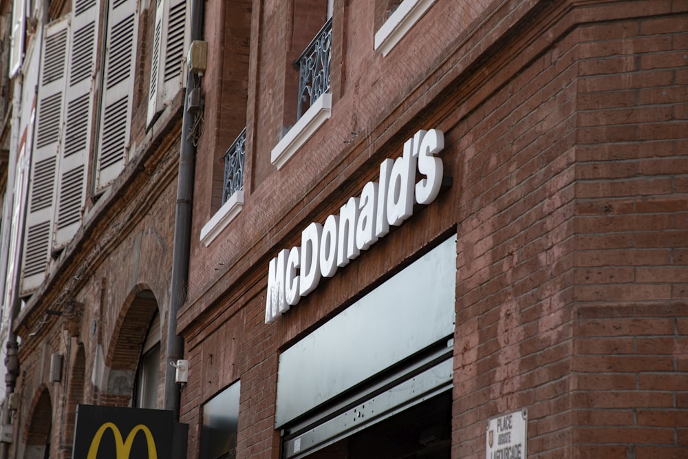 a mcdonald's sign on the side of a building