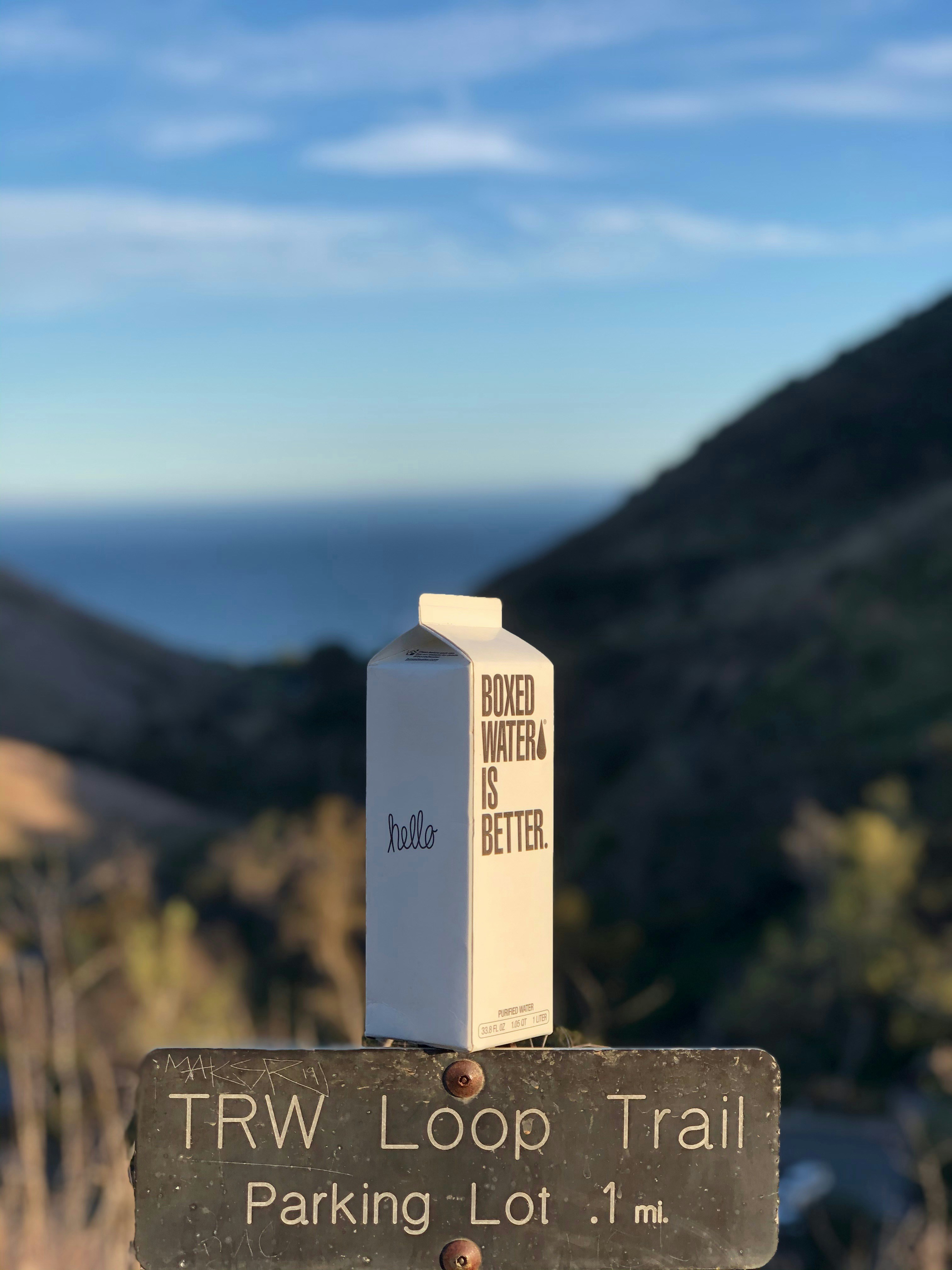 a sign that is on top of a hill