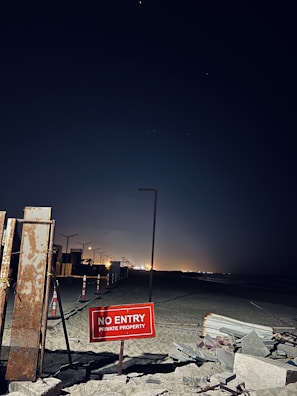 Evening view of a secured property with external lighting to deter trespassers.