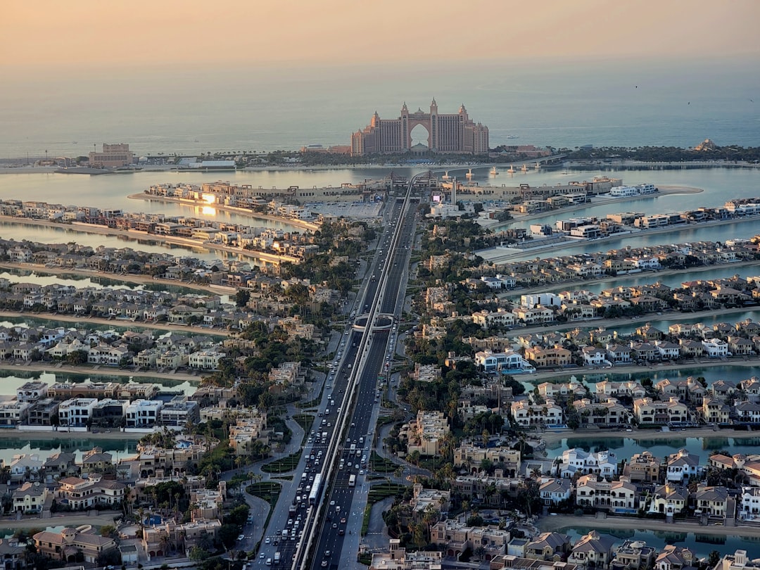 an aerial view of a city with lots of traffic,
