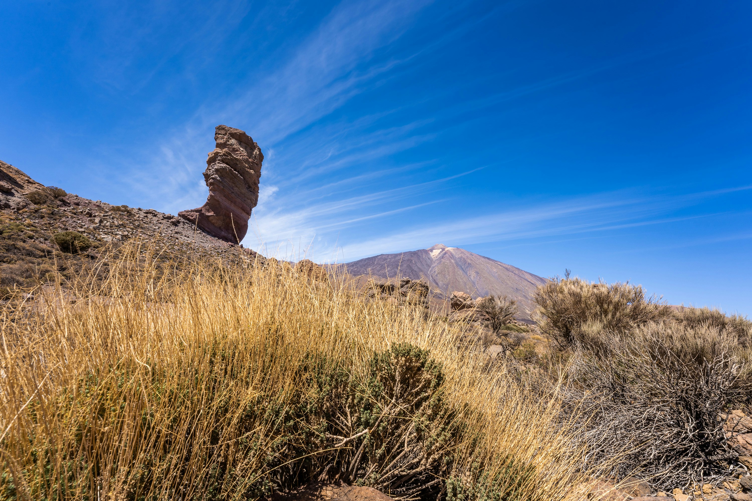 a rock formation in the middle of a desert