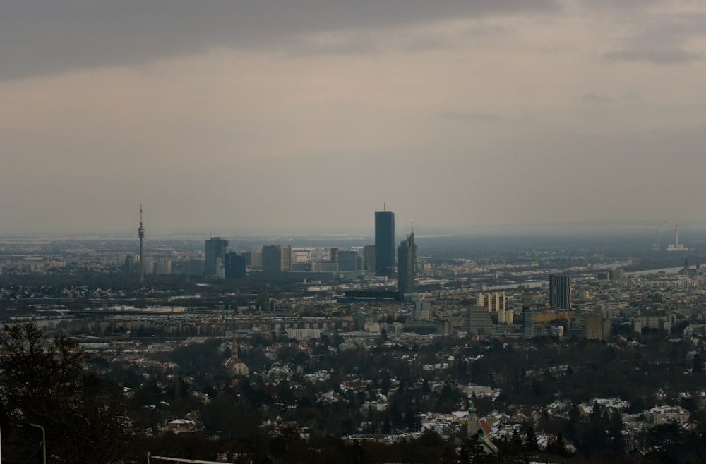 a view of a city from the top of a hill