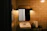 Close-up of a sleek frameless LED bathroom mirror glowing softly with even backlighting.