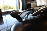 Finished car gleaming under showroom lights with flawless paint and wrap.