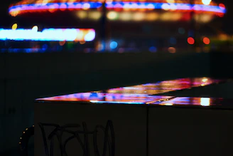 High-contrast cinematic scene with sleek characters under moody city lights