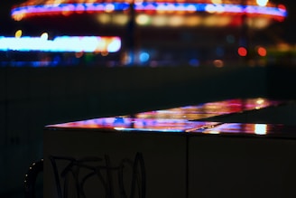 A dynamic urban gaming scene with neon black and purple colors.