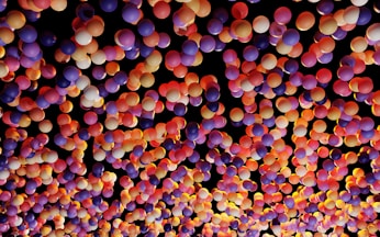 A festive display of birthday balloons in vibrant colors.
