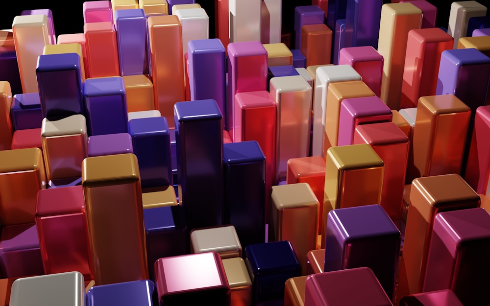 a large group of multicolored cubes with a black background