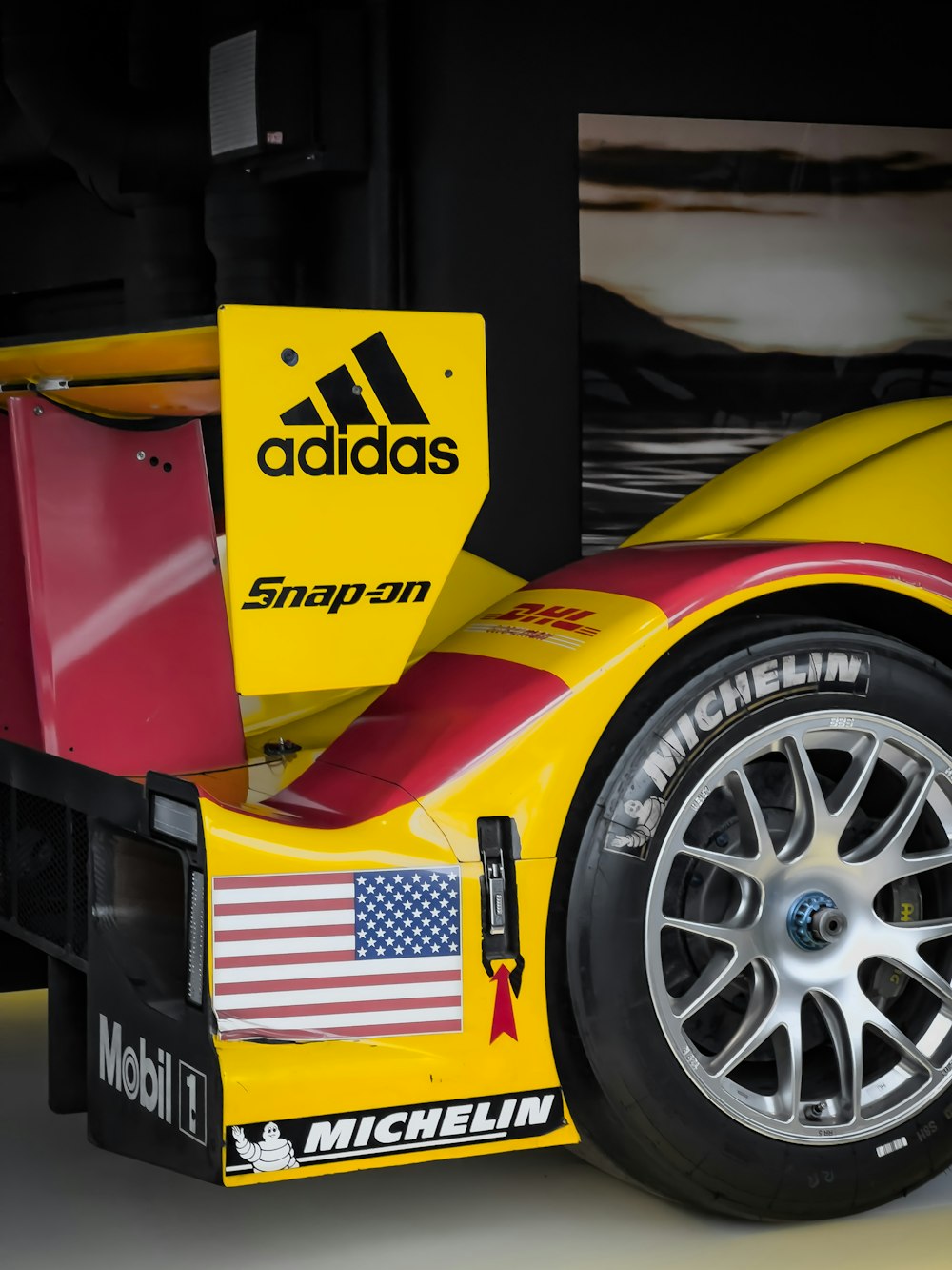 a close up of a yellow race car