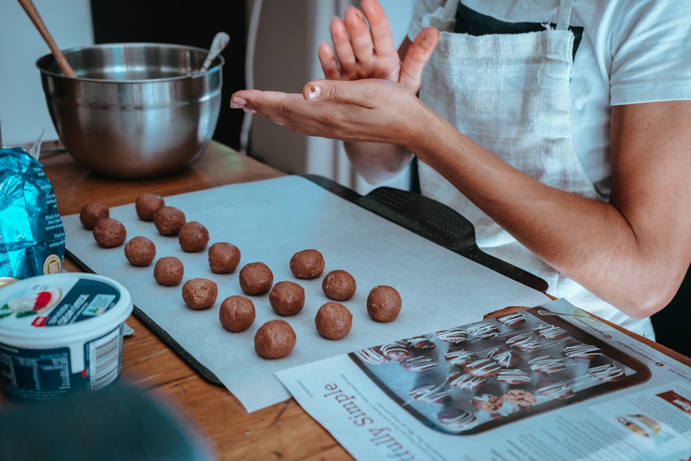 a person is making some food on a table