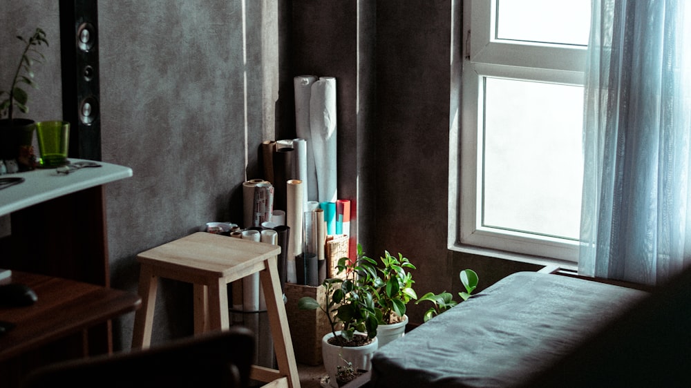 a living room filled with furniture and a window