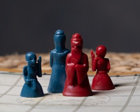 a close up of a game board with pieces of plastic