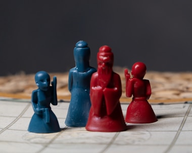 a close up of a game board with pieces of plastic