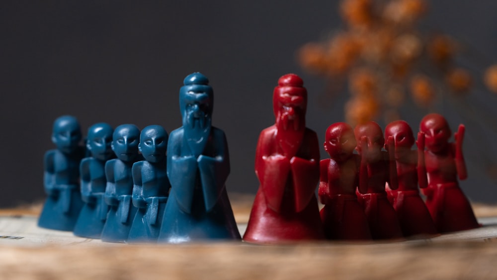 a group of small figurines sitting on top of a table