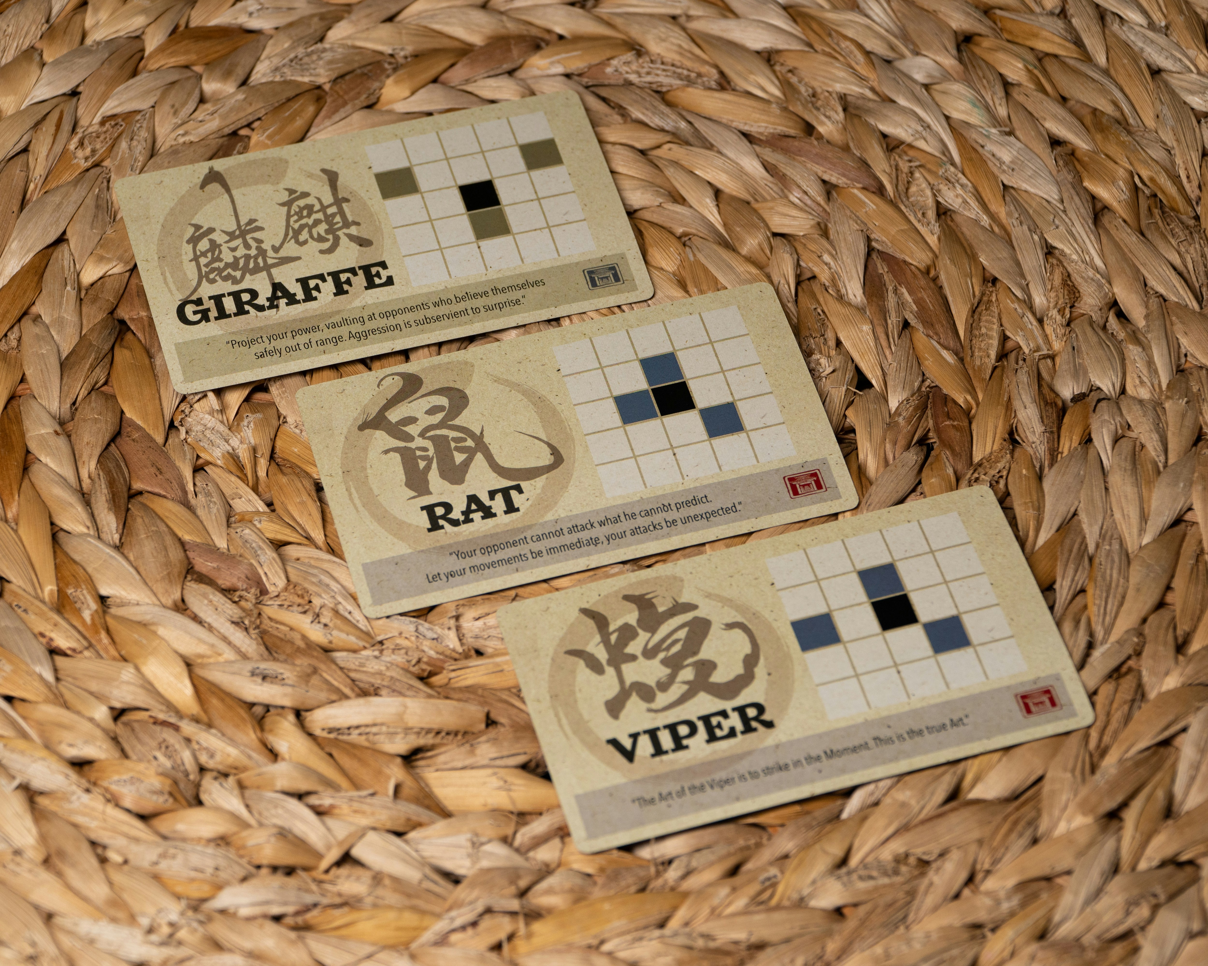 a couple of business cards sitting on top of a woven basket