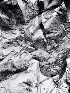 Close-up of aluminum scrap pieces neatly arranged, highlighting their texture and shine